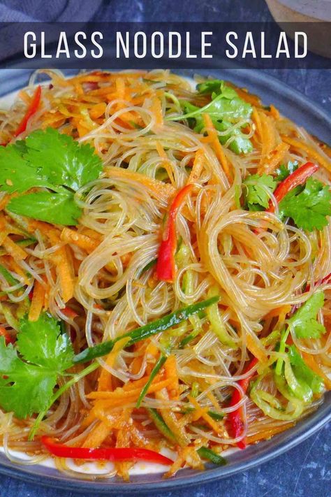 A popular Chinese appetizer, glass noodle salad combines springy noodles, crunchy vegetables and a mouthwatering dressing. It’s vegan and gluten-free adaptable. Asian Salad With Noodles, Japanese Glass Noodle Salad, Glass Noodle Sauce, Glass Noodle Salad Recipes, Chinese Glass Noodle Recipes, Recipes With Glass Noodles, Glass Noodle Recipes, Thai Glass Noodle Salad, Monthly Meals