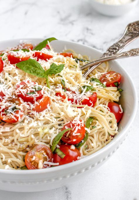 This easy pasta dish is one of my absolute summer favorites. It's made with 5 ingredients, uses fresh tomatoes, basil and garlic and topped with a salty cheese! Pasta Basil Tomato, Pasta Basil, Easy Pasta Dishes, Angel Hair Pasta, Dinner This Week, Angel Hair, Rice Krispie Treats, Pasta Dish, Summer Favorites