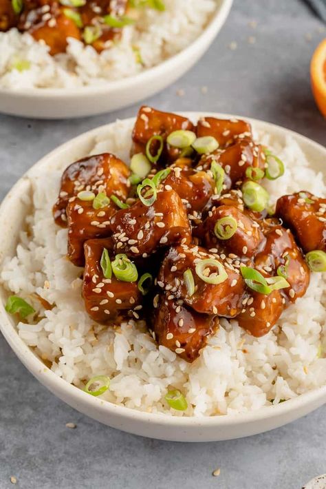 This vegan take on a classic orange chicken recipe checks all the boxes! A crispy pan-fried tofu smothered in a zesty orange sauce-- it can be made gluten-free, is easy to prepare, and ready in about an hour. #orangetofu #vegantakeout #vegandinner #veganentree #chineseamerican #pandaexpress #sweetsimplevegan Vegan Orange Chicken Recipe, Vegan Take Out, Cooked Tofu, Orange Tofu Recipe, Vegan Spring Recipes, Orange Tofu, Firm Tofu Recipes, Recipes Tofu, Plant Based Gluten Free