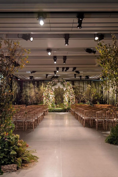 A stunning floral entrance filled with vibrant roses and greenery, perfect for elegant event decor or a wedding reception welcome moment. Indoor Forest Wedding, Floral Entrance, Floral Ceremony Arch, Indoor Forest, Event Space Design, Floral Ceremony, Bring The Outdoors Inside, Private Event Space, Forest Setting