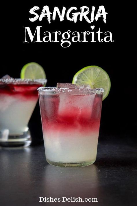 Adding wine to a margarita is not only a brilliant idea but a delicious one as well! This sangria margarita is beautiful and the perfect party cocktail! #margarita #sangria #sangriamargarita #dishesdelish Sangria Margarita Recipe, Sangria Margarita, Margarita Sangria, Margarita Cocktails, Cocktail Margarita, Tequila Recipe, Drink Garnishing, Margarita Recipes, Alcohol Drink Recipes