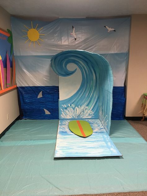 Surf Theme Party Decorations, Cardboard Waves Diy, Beach Stage Decor, Wave Decorations Party, Waves Decoration Ocean Themes, Surfs Up Decorations, Diy Wave Backdrop, Cardboard Waves, Beach Theme Backdrop