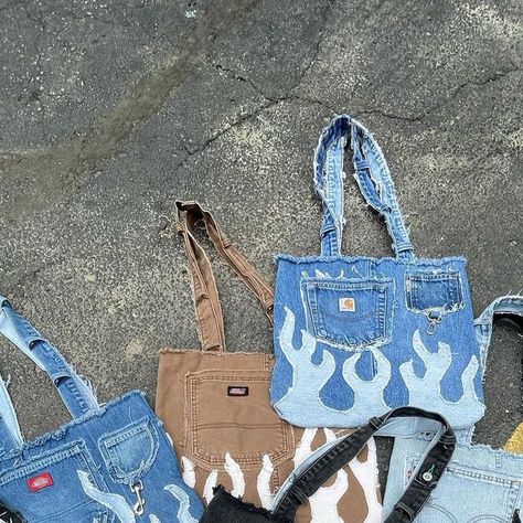 @second_vibess on Instagram: "Reworked Flame Totes dropping on our website Friday at 6pm est ♻️✂️ A new smiley collection will be available too! 🙂🙂 Turn on our notifications so you don’t miss out Totes are the perfect everyday bag, and it’s even better when they’re made from 100% sustainable material #sustainablefashion #slowfashion #reworked #1of1" Clothes Redesign Diy Fashion, Reworked Clothes Diy Ideas, Reworked Clothes Diy, Reworked Bag, Denim Hacks, Jeans Tote Bag, Reworked Jeans, Waste Art, Reworked Clothes