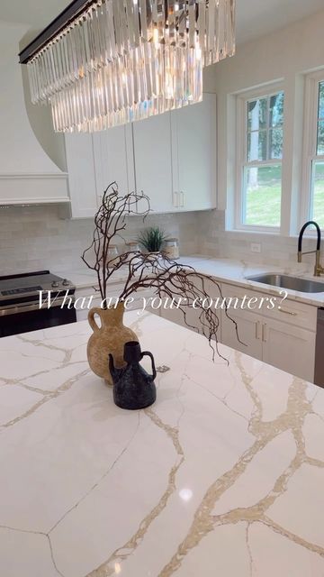 Christina Landsman | Maryland Realtor ® on Instagram: "Tired of the gray and white quartz? We’re here for this tan veining with a touch of gray. Calacatta Lara gold is the perfect choice! #countertops #countertop #quartz #quartzcountertops #kitchendecor #kitchencountertops #kitchencountertop #kitchencounters #kitcheninspiration #newhomes #newhomeconstruction #buildingahome #newhometips #homebuilding #realtortips" Eternal D’or Quartz Countertop, Brown Veined Quartz Countertops, Quartz Remnants Ideas, Gold Vein Quartz Countertop, Brittanica Gold Cambria Quartz, White And Gold Quartz Countertops, Quartz With Brown Veining, Tan Quartz Countertops, Calcutta Gold Quartz Countertops