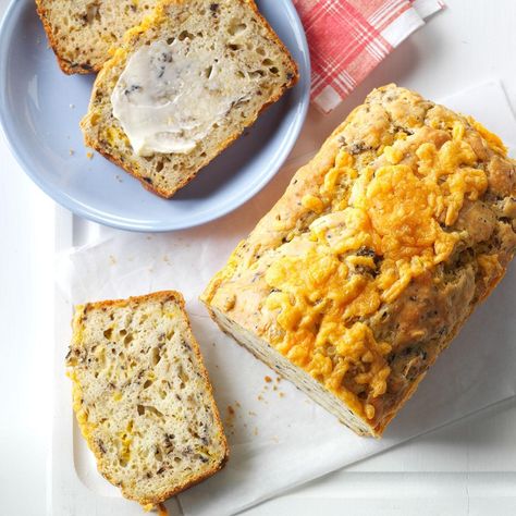 Olive & Onion Quick Bread Recipe: How to Make It Onion Cheese Bread, Office Potluck Recipes, Garlic Cheese Biscuits, Bread Without Yeast, Zucchini Cheese, Savory Breads, Cheesy Biscuit, Creamed Leeks, Olive Bread