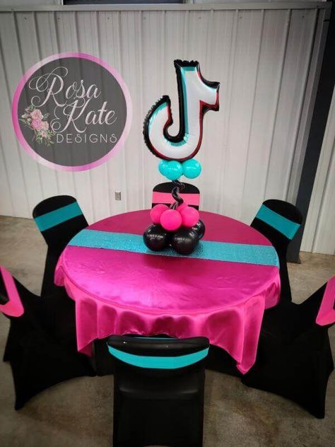 Induce a trendy appeal into your party setup by using a tik tok themed décor. Deck up your round tables with fuchsia satin square overlays and layer turquoise sequin runners on top. Set up a balloon centerpiece using black, turquoise, and fuchsia latex balloons along with Mylar balloons resembling the tik tok brand logo. Also, adorn the party chairs with black spandex covers in combination with fuchsia and turquoise sashes to portray astounding grandeur. Balloon Column Stand, Balloon Stand, Balloon Holders, Plastic Balloons, Party Chairs, Balloon Kits, Clear Balloons, Party Setup, Metallic Balloons