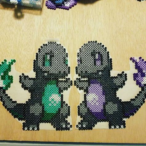 When I should off the Halloween themed Pokemon a couple days ago, someone suggested I make a purple Charmander ghost, and I had to… Charmander Cross Stitch, Pokemon Cross Stitch, Pixel Art Pokemon, Pokemon Pattern, Pokemon Perler Beads, Pixel Beads, Perler Art, Melty Beads, Halloween Beads