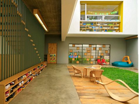 Shining Stars Kindergarten, located in the Indonesian capital of Jakarta, contains small courtyards to promote the flow of natural light and natural-wood play spaces to make kids feel like they're outside. Kindergarten Interior, Open Trap, Bibliotheque Design, Hospital Architecture, Kindergarten Design, School Interior, Education Architecture, Education Design, Salou