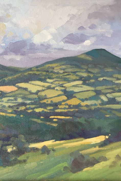 Landscape oil painting of Sugar Loaf Mountain in Wales, with green and blue patchwork fields and a moody sky, in an impressionistic style Patchwork Fields, Welsh Valleys, Painting On Wooden Board, Welsh Landscape, House Oil Painting, Welsh Art, Sugar Loaf Mountain, Mountain Oil Painting, Moody Sky