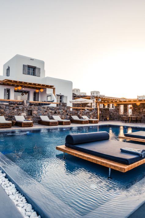 Located just steps from the beach, you'll have direct access to the crystal-clear waters and soft sands of Mykonos 🏖️ Soak up the sun on Villa Sapheiros's private deck or take a refreshing dip in the pool. The outdoor living space also includes a barbecue grill, perfect for al fresco dinners under the stars 🌠 Al Fresco Dinner, Mykonos Town, Soak Up The Sun, Private Deck, In The Pool, Barbecue Grill, Crystal Clear Water, Under The Stars, Greek Islands