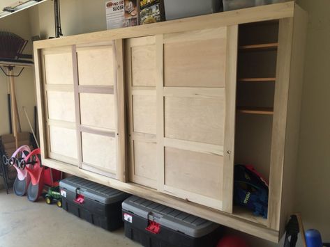 Diy Sliding Door Cabinet, Cabinets With Sliding Doors, Build Garage, Custom Garage Cabinets, Pallet Deck Diy, Diy Garage Cabinets, Cabinet With Sliding Doors, Sliding Door Cabinet, Garage Storage Cabinet