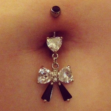 Bow belly ring from Beverly Hills Body Jewelry Lakeside Belly Piercings, Bellybutton Piercings, Belly Button Piercing Jewelry, Dope Jewelry Accessories, Belly Piercing Jewelry, Button Piercing, Pretty Ear Piercings, Belly Button Jewelry, Cool Piercings