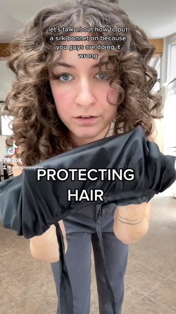 Gal 🇨🇦 Wavy Hair Tips on Instagram: "Sleeping with silk bonnets and silk scarves is one of the many healthy hair & hair styling techniques that originated from the wealth of knowledge shared within the black hair community ❤️ all hair types can benefit from sleeping on silk - here are some of the benefits❤️ ⭐️less moisture loss ⭐️less frizz and breakage ⭐️no sweartfrom your neck getting in your hair !! Lol ⭐️keeps hair product off your skin which can prevent or reduce breakouts … Just to name Silk Night Cap Hair, Protective Sleep Hairstyles Wavy, Sleeping Bonnet Curly Hair, How To Wear A Bonnet Curly Hair, How To Put Hair In Bonnet, Silk Bonnet Benefits, How To Make A Silk Hair Bonnet, How To Sleep On Wavy Hair, Curly Sleep Hairstyles