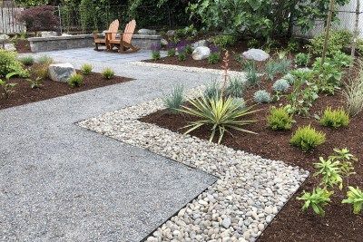 Gravel Grandeur - Dennis' 7 Dees | Landscaping Services & Garden Centers Free Landscape Design, Clean Patio, Mulch Landscaping, Residential Landscaping, Modern Backyard Landscaping, Garden Centers, Modern Landscape Design, Modern Backyard, Drought Tolerant Plants