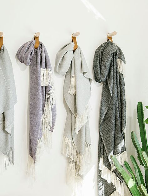 Display throw blankets on the wall so they can stop taking up a whole shelf in your linen closet. Hanging Blankets On Wall, Throw Blanket Storage, Office Closet Ideas, Blanket Display, Scarf Display, Blanket On Wall, Linen Closets, Linen Closet Organization, Wall Closet