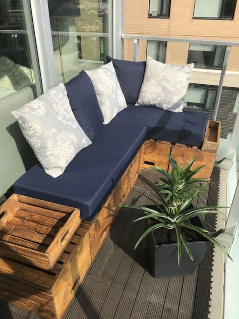 Custom made corner couch for tiny balcony.  Made with wood crates and hand made seat cushions and pillows. Balcony Couch Diy, Diy Balcony Couch, Tiny Balcony Seating, Diy Balcony Seating, Small Balcony Sofa, Balcony Bench Ideas, Micro Balcony, Small Balcony Bench, Corner Balcony Ideas