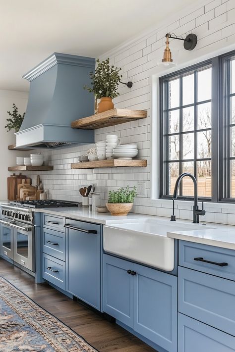 Discover the latest kitchen design trends with this elegant blue cabinetry and rustic wooden shelving. Perfectly combines modern and farmhouse styles with sleek appliances and a cozy vibe. Ideal for anyone looking to revamp their kitchen #LatestKitchenDesign #BlueDecor #FarmhouseStyle Blue Farmhouse Kitchen, Diningroom Ideas, Blue Cabinetry, Blue Kitchen Designs, Kitchen Open Shelves, Turquoise Kitchen Decor, Wooden Shelving, Farmhouse Kitchen Inspiration, Light Blue Kitchens