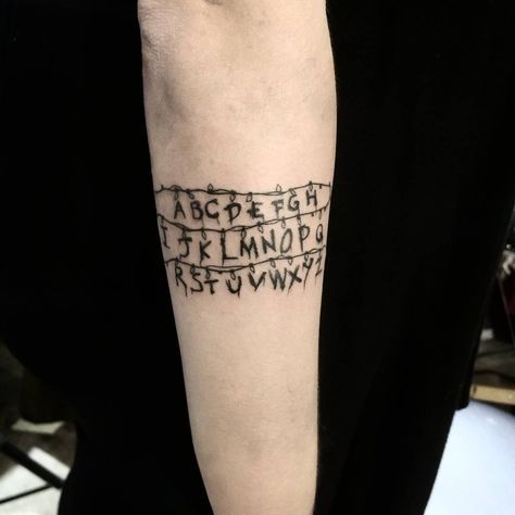 Stranger Things Tattoos | POPSUGAR Beauty Stranger Things Lights, Stranger Things Tattoo, Supernatural Tattoo, Stranger Things Costume, Movie Tattoo, Movie Tattoos, Light Tattoo, Character Change, Tattoos Skull