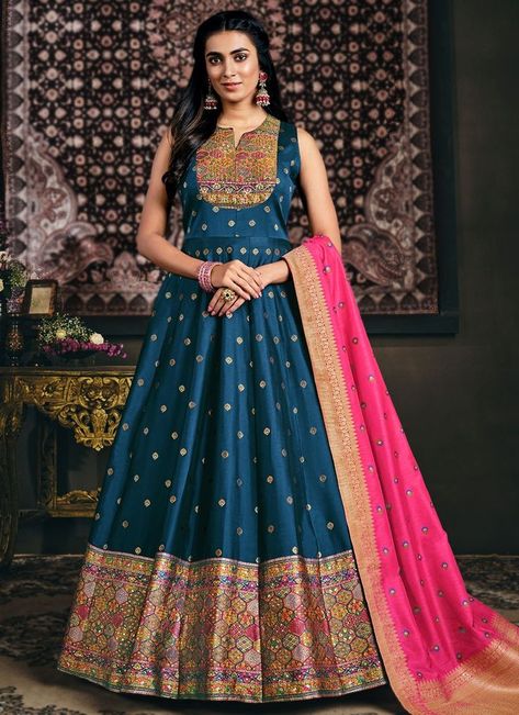 Woven Work Jacquard Readymade Designer Gown You are confident to make a strong style statement with this navy blue jacquard readymade designer gown. The wonderful attire creates a dramatic canvas with extraordinary woven work. Product Code: 106105 Price USD $153.17 Shop @ https://bit.ly/3fXsurs Silk Anarkali Gown, Party Wear Anarkali, Bridal Anarkali, Indo Western Dresses For Women, Gown With Dupatta, Designer Gown, Indian Party Wear, Indo Western Dress, Anarkali Gown