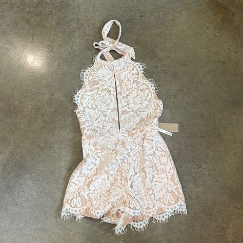 Adorable Women’s Backless Lace Romper. Never Been Worn, New With Tags. Romper Has Frayed Lace, Scalloped Edging With A Nude Liner To Cover Everything. Has A Deep V Cutout Neck. Could Be Dressed Up Or Down. Wedding After Party Outfit, After Party Outfit, Bridal Romper, Chambray Romper, White Lace Romper, Wedding After Party, Jumpsuits Women, Sequin Rompers, Wrap Romper