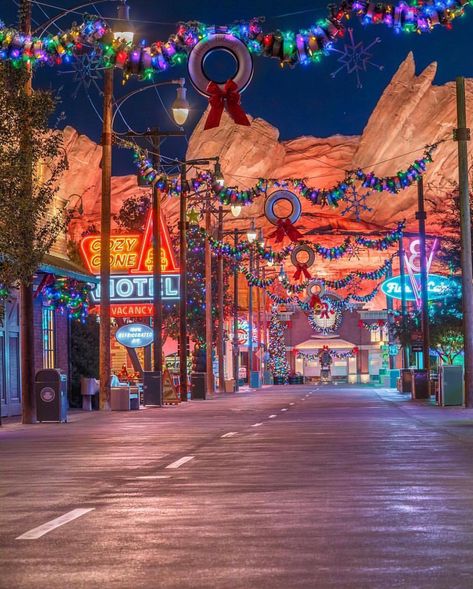 TXDisney on Instagram: “Loving the Cars Land Christmas Decorations at Disneyland!!! 🏰🐭🎁💙🎅🏻🎄❤️❄️🌌❤️❄️🎄🎅🏻💙🎁🐭🏰 📷: @disneyland_over_everything #disney #disneyworld…” Cars Land Christmas, Christmas In California Aesthetic, Disneyland California Christmas, Disneyland During Christmas, Disneyland Christmas Wallpaper, Disneyland Christmas Aesthetic, Christmas In Disneyland, Disneyland At Christmas, Christmas At Disneyland