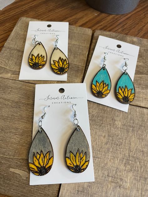 Wood Burned Colorful Sunflower Teardrop Earrings | Etsy Colorful Sunflower, Wood Burning Techniques, Wood Jewelery, Laser Engraved Ideas, Wood Burning Crafts, Hand Painted Earrings, Wood Burning Patterns, Painted Earrings, Painted Jewelry