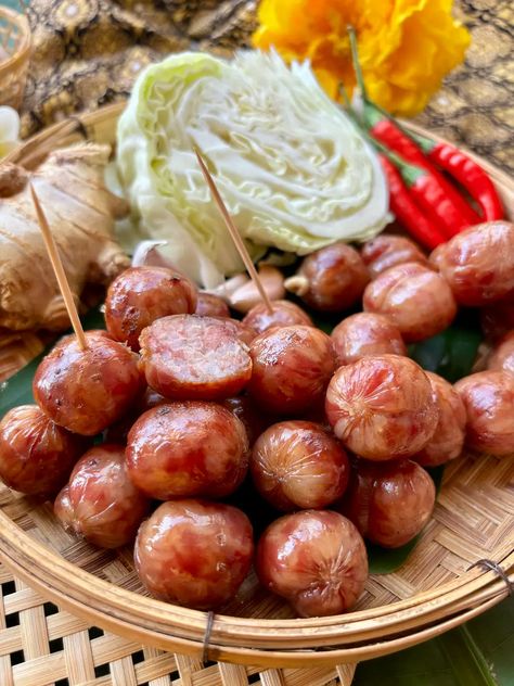 Make the best sai krok Isan with this authentic Thai sausage recipe. Perfect as a snack on the go or as a side for your next meal. Thai Sausage Recipe, Asian Sausage Recipe, Lao Sausage Recipe, Thai Dumplings, Thai Sausage, Homemade Dipping Sauce, Lao Food, Sausage Making, Thai Foods