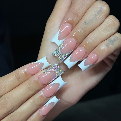 Can never go wrong with some frenchies & some bling 💖 Products used: “Bad N Boujjee” acrylic “045” gel polish all from @vbeautypure #nails #nailtech #acrylicnails #explore #explorepage #frenchnails #blingfrenchies #frenchtipnails French Tip Nails With Righnstones, French Tip Jewel Nails, White French Tip Nails With Diamonds, French Tip With Gems Rhinestones, French Tips With Bling, French Tip Acrylic Nails With Rhinestone, French Tip Nails With Diamonds, French Tip With Diamonds, Ring Finger Nails