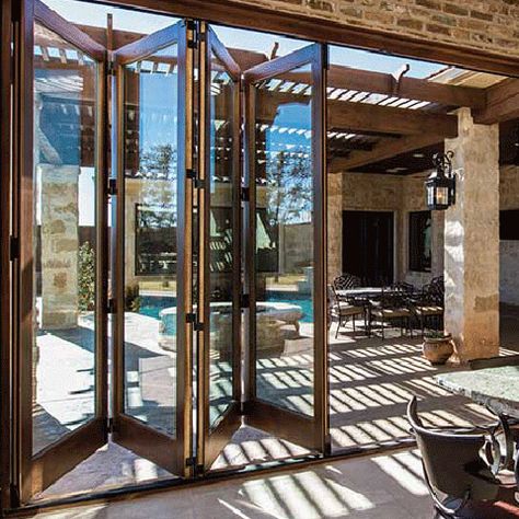 Extend your living space to the great outdoors with bifold patio doors from your local Pella Showroom. Wood Patio Doors, Pella Doors, Bifold Patio Doors, Patio Door Blinds, Folding Patio Doors, Steel Entry Doors, Patio Grande, Folding Glass Doors, French Doors Patio