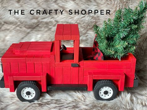 Hi everyone, I thought I share my new upgraded version of my Jenga Block Truck I made last February, Christmas edition. I added a little more detail to the truck aswell it has leather interior seating ☺️. I used just over 4 boxes of jenga blocks. 🎅🎄. #Jengablocktruck #dollartree #thecraftyshopper #jengablock #dollartreechristmas #dollarama #tumblingtower #farmhousecrafts #dollartreeredtruck #jengablockcrafts #dollartreecrafts #dollartreediy Jenga Block Truck, Jenga Block Crafts Diy Dollar Tree, Jenga Block Christmas, Diy Jenga Blocks Ideas, Truck Crafts, Jenga Game, Truck Diy, Jenga Blocks, Wood Block Crafts