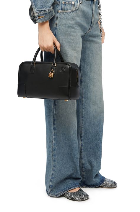 LOEWE Amazona 28 bag in nappa calfskin Black Luxury Suitcase, Loewe Amazona, Luxury Luggage, Soft Bag, Loewe Bag, Black Luxury, Dark Khaki, The 1970s, Black Metallic