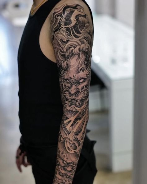 15 Breathtaking Dragon Tattoo Ideas to Ink! Dragon Chino Tattoo, Dragon Tattoo Full Sleeve, Japanese Forearm Tattoo, Ink Dragon, Japanese Leg Tattoo, Dragon Tattoo Arm, Koi Tattoo Sleeve, Dragon Tattoo Sketch, Dragon Tattoo Ideas