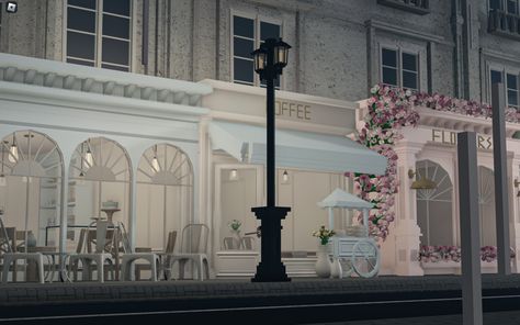 Realistic Bloxburg Cafe Exterior, City Builds Bloxburg, Nyc Cafe Bloxburg, Bloxburg Paris Town Layout, Bloxburg Shop Exterior, Costal Town Bloxburg, Paris Bloxburg Layout, Bus Stop Bloxburg, Bloxburg Fancy Restaurant