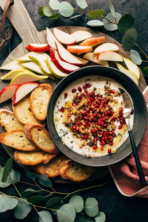 Christmas Feta! Christmas Feta is here for the holidays! Smooth and creamy whipped feta topped with orange zest, pomegranate seeds, candied nuts, and fresh thyme. It's basically a delicious ornament in a bowl! #feta #whippedfeta #appetizer Chicken Wild Rice Casserole, Feta Recipe, Pinch Of Yum, Pomegranate Recipes, Caramelized Onion Dip, Delicious Dips Recipes, Feta Recipes, Feta Dip, Whipped Feta