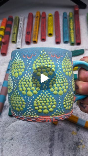 Jonah Harjer on Instagram: "More underglazes on these pattern mugs today. // The greenish blue underglaze on this mug has been bisque fired on. After that I applied an orange underglaze wash and through trial and error I have learned that when I apply an underglaze wash on top of another underglaze it's pretty much going to look exactly the way it does now when it comes out of the kiln later. // I wasn't super happy with the way the orange looked inside the recessed areas of the stamp so I decided to add some sour Apple mayco stroking coat so that the recessed areas will be glossy glaze and the rest of the mug will be velvety. // Hopefully these come out good as I don't have a lot of experience with maycos brand. I love experimenting and so either way I will definitely win or learn Amaco Velvet Underglazes, Underglaze Designs, Amaco Glaze Layering Snow, Underglaze Pencil, Ceramic Underglaze Pencils, Underglaze Vs Glaze, Greenish Blue, Glaze, That Look