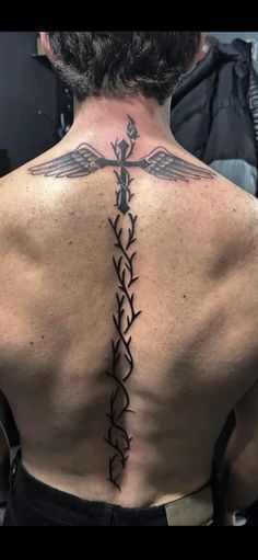 Men’s Back Tattoo Spine, Mens Tattoos Ideas Back, Men’s Spine Tattoos, Mcgregor Back Tattoo, Men S Back Tattoo, Men Spine Tattoo, Men Chest Tattoo Ideas, Spine Tattoos For Men, Upper Back Tattoo Men