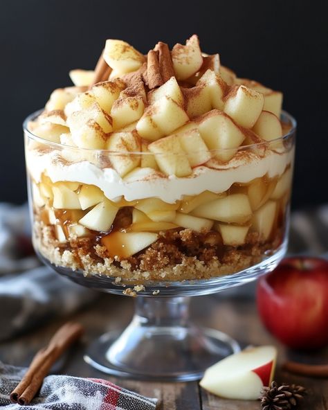 "This Apple Cinnamon Trifle is a cozy dessert that's perfect for fall! It layers sweet apples, creamy vanilla pudding, and crunchy graham crackers. You’ll be craving this comforting treat!  For three decades, I've been making this trifle recipe every autumn. It's sweet, crunchy, and just brings back so many happy memories around the table!  Ingredients: - 3 cups of diced apples - 1 teaspoon of cinnamon - 2 cups of vanilla pudding (Link in first comment [👇] [👇]  Enjoy this delightful dessert with friends and family!  #AppleCinnamon #TrifleRecipe #FallDessert #ComfortFood #YummyDessert" Cinnamon Trifle, Dessert Truffles, Sweet Apples, Trifle Desserts, Diced Apples, Trifle Recipe, Fall Apples, Vanilla Pudding, Dessert Cupcakes