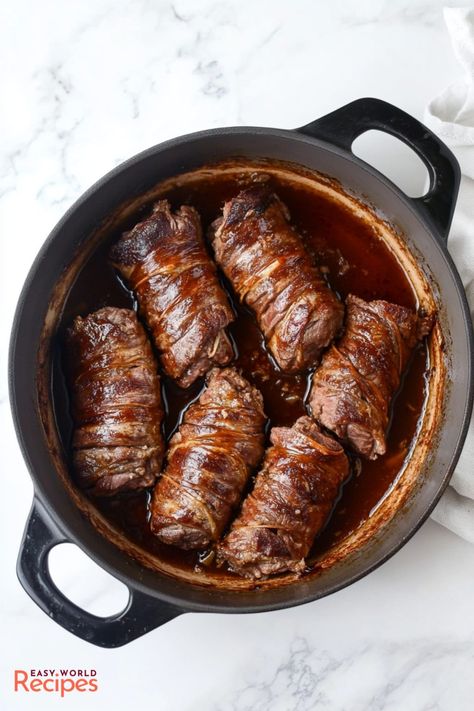 Beef Braciole al Sugo Recipe (Involtini) - EasyWorldRecipes Italian Menu Ideas, Italian Beef Braciole, German Dinners, Braciole Recipe Italian, Beef Braciole Recipe, Sugo Recipe, Italian Braciole, Steak Ideas, Italian Dinner Ideas