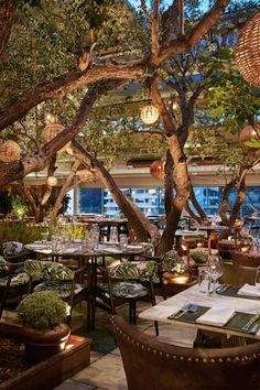 If you can score an invite to members-only club, Soho House West Hollywood, a beautiful rooftop forest and a plate of lobster spaghetti await you. Tree Restaurant Design, Trees Inside Restaurant, Rooftop Forest, Trees In Restaurants, Forest Restaurant Outdoor, Tropical Rooftop Bar, Budapest Cafe, Lobster Spaghetti, Most Beautiful Restaurants