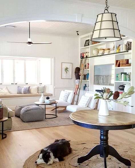 Living Room With Ladder, Library Wall In Living Room, Tv And Bookcase Wall, Room Library Ideas, Cozy Coastal Living Room, Cozy Reading Room, Wall In Living Room, Queenslander House, Modern Tv Room