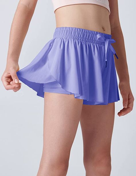 89% Nylon, 11% Spandex
Pull On closure
Machine Wash
MULTIPACK: Set of 3 girls butterfly shorts with spandex underneath. Cute, soft, and comfy trendy shorts for kids.
QUICK-DRY: Buttery soft, featherweight, breathable fabric wicks sweat and keeps teens fresh and cool in any sport.
BUILT-IN SPANDEX: Pleated skirts with shorts underneath for girls features flowy outer layer and compression liner underneath. Purple Workout Shorts With Elastic Waistband, Summer Yoga Skort With Built-in Shorts, Purple Athletic Shorts With Built-in Liner For Sports, Blue 2-in-1 Athletic Shorts For Yoga, Purple Sportswear Shorts With Built-in Liner, Butterfly Skirt, Flowy Shorts, Active Shorts, Spandex