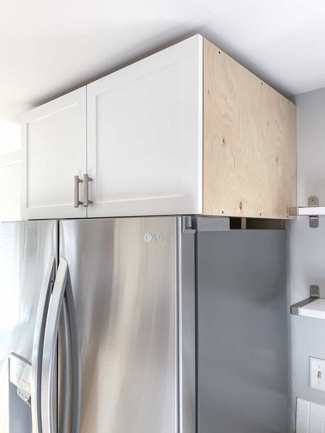 Put the space over your refrigerator to good use! This DIY over fridge cabinet is easy to make and adds a ton of storage to your kitchen! Floating Cabinet Above Fridge, Over The Fridge Cabinet Ideas, Floating Shelves Above Fridge, Over Fridge Cabinet, Cabinets Above Refrigerator, Cabinet Above Fridge, Fridge Cabinet Surround, Over The Fridge Cabinet, Cabinet Above Refrigerator