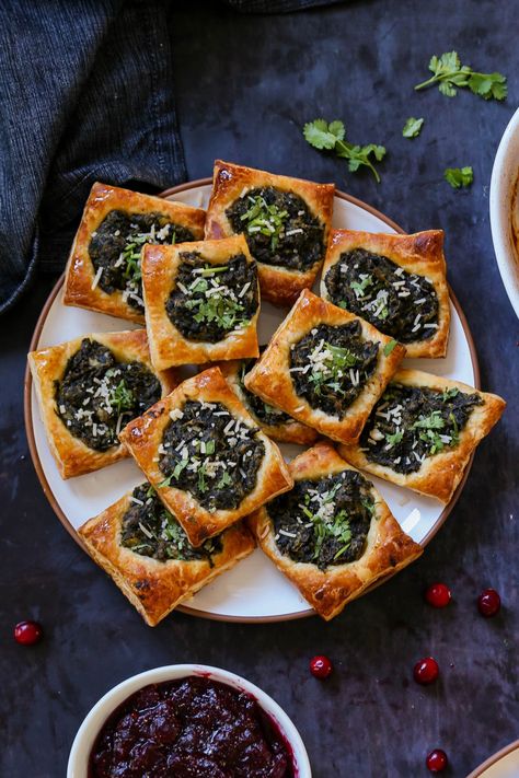 spinach puff pastry on a serving platter Vegan Swaps, Spinach Puffs, Dips Appetizers, Spinach Puff Pastry, Vegan Finger Foods, Spinach Puff, Pastry Appetizer, Vegan Richa, Vegan Parmesan