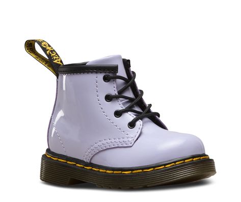 A mini 1460 for babies, this lavender patent leather boot features an ankle zip for little fingers (and exhausted parents). The boot still comes with all the classic Doc's DNA though, like grooved edges, yellow stitching and scripted heel-loop. Doc Martin Shoes, Purple Dr Martens, Doc Martins Shoes, Kids Outfits Daughters, Martin Shoes, Doc Martin, Black Dr Martens, Purple Heather