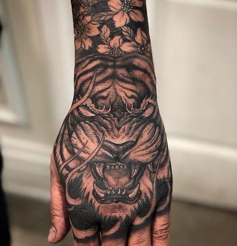 Tiger hand piece by CJ. Done at Chronic Ink Tattoo - Toronto, Canada Leprechaun Tattoos, Fist Tattoo, Tiger Hand Tattoo, Japanese Hand Tattoos, Hand Tattoo Images, Tattoo Toronto, Tiger Tattoo Design, Forarm Tattoos, Forearm Sleeve Tattoos