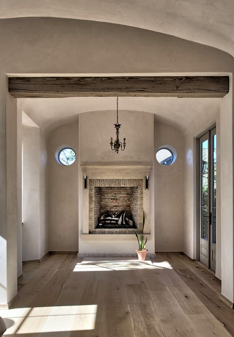 Elevated Fireplace, Raised Fireplace, Modern French Farmhouse, Tuscan Style Homes, Dining Room Remodel, Mediterranean Home Decor, Bedroom Fireplace, Empty Room, Mediterranean Home