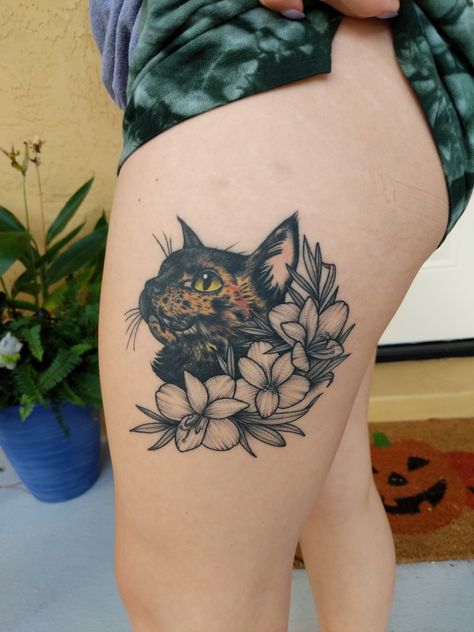 Tortoiseshell cat portrait tattoo with black and white flowers Cat Tattoo Tortoiseshell, Tortoise Cat Tattoo, Torti Cat Tattoo, Tortoise Shell Cat Tattoo, Tortoiseshell Cat Tattoo, Cat Flowers Tattoo, Tortishell Cat Tattoos, Cat Tattoo Flowers, Tortie Cat Tattoo