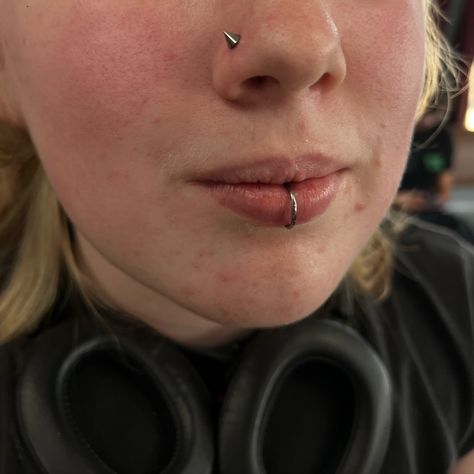 freshly punctured nose piercing, she opted for a spiked upgrade & changed out her labret to a hoop! i love the set up smmm 🙀 Spike Nostril Piercing, Lip Hoop Piercing, Labret Hoop, Piercing Labret, Nose Piercings, Labret Piercing, Piercing Ideas, Witchy Things, Nose Piercing