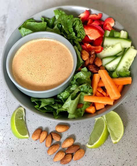 This thai inspired almond butter salad dressing recipe has a fresh zesty flavour from the lime making it taste light and refreshing yet satisfying and filling with the almond butter sauce. The thai salad dressing is served over a bed of fresh romaine, car Thai Salad Dressing, Almond Butter Sauce, Tamari Almonds, Sauce For Vegetables, Oil Free Salad Dressing, Delicious Healthy Salads, Almond Salad, Homemade Almond Butter, Healthy Whole Food Recipes