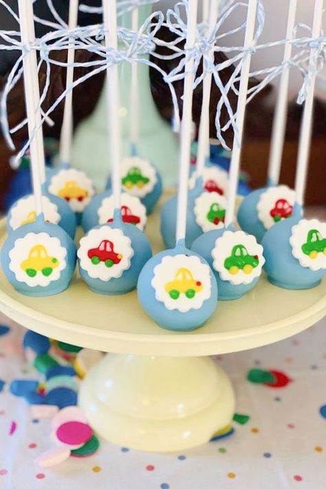 Check out this awsome car-themed birthday party! The cake pops are so much fun! See more party ideas and share yours at CatchMyParty.com Truck Cake Pops, Vehicle Themed Birthday Cake, Car Cake Pops, Car Theme Dessert, Cake Pop Transportation, Vehicles Theme Cake, Cars Cake Pops, Cars Trucks Birthday Party, Second Birthday Cakes